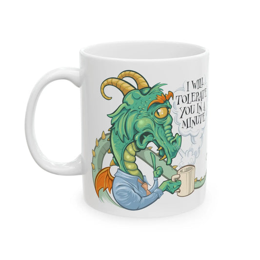 White mug with a cartoon dragon design and text on a white background