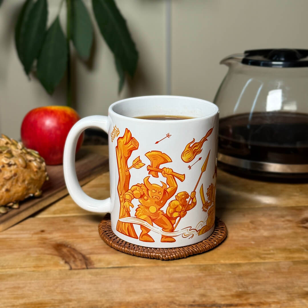Side view of Orc Fuel ceramic mug with cartoon battle scene: warriors, fireballs, and flying arrows.