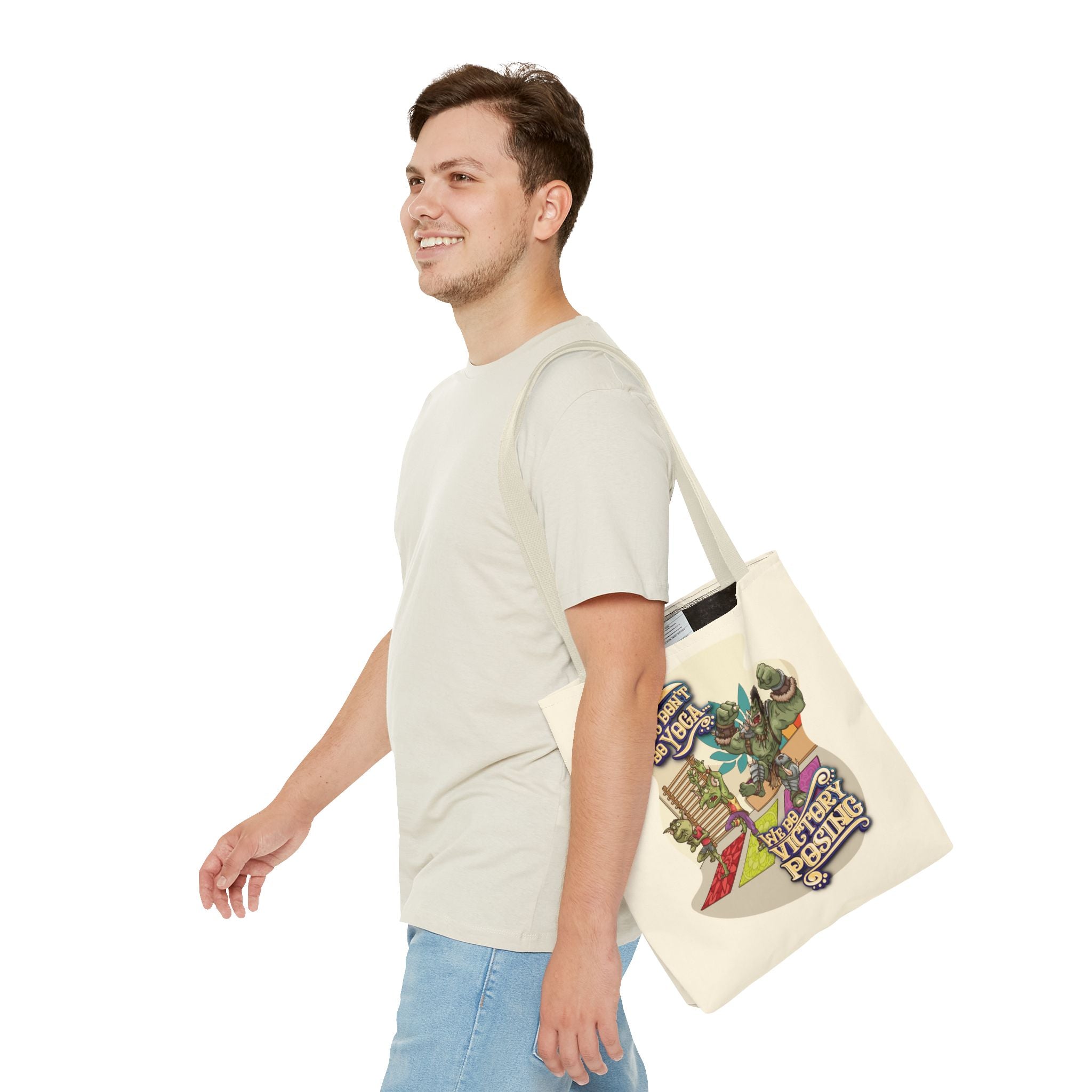 Man carrying a tote bag with a colorful design on a white background