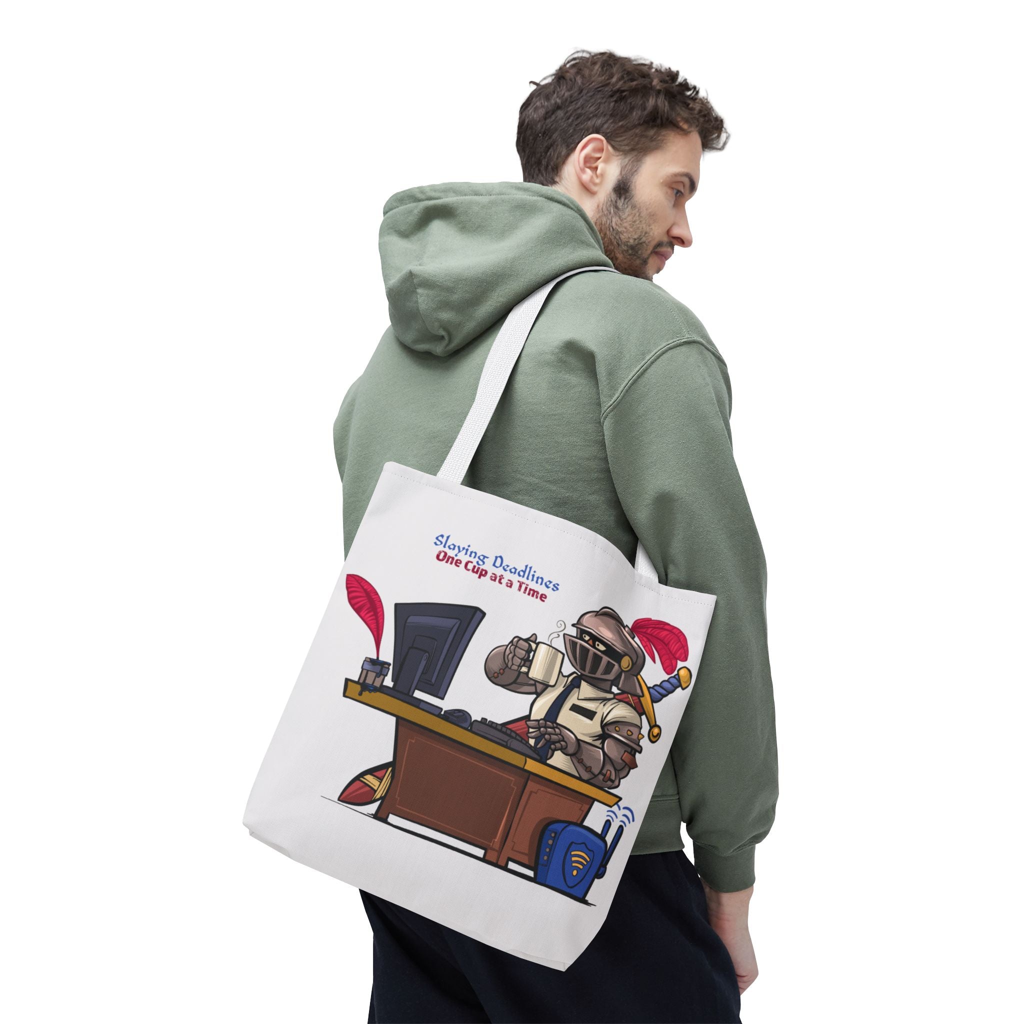 Person wearing a green hoodie carrying a tote bag with a graphic design on a white background