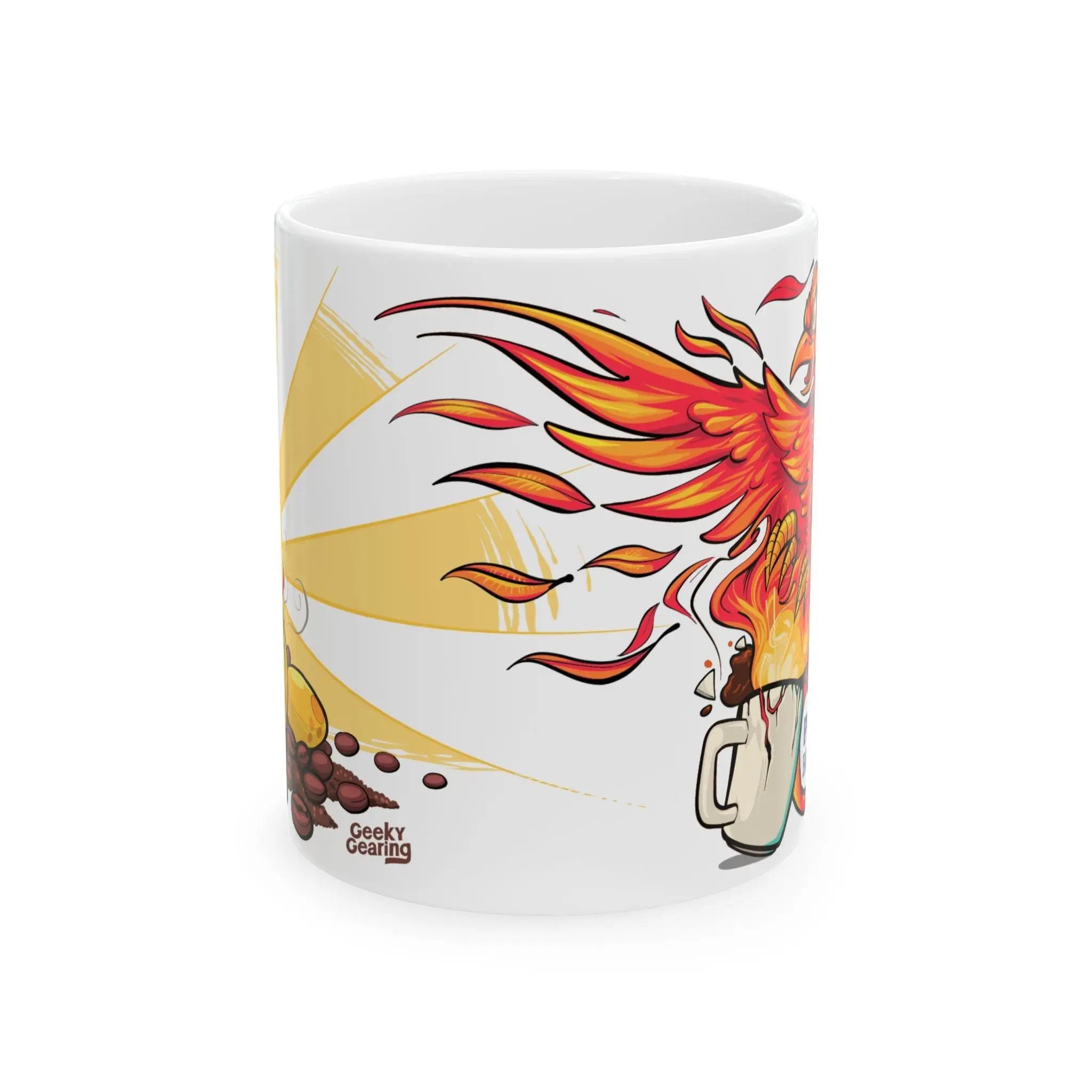 Front angle of the Phoenix Fuel mug, showing the transition between the cartoon phoenix hatching on one side and the fiery adult phoenix rising from a coffee mug on the other. Bright, whimsical fantasy artwork with sunrise and coffee bean details.