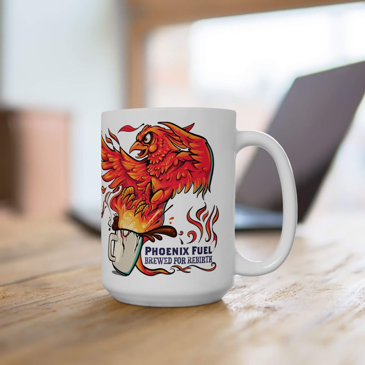 White mug with a phoenix design and 'Phoenix Fuel Brewed for Rebirth' text on a wooden surface.