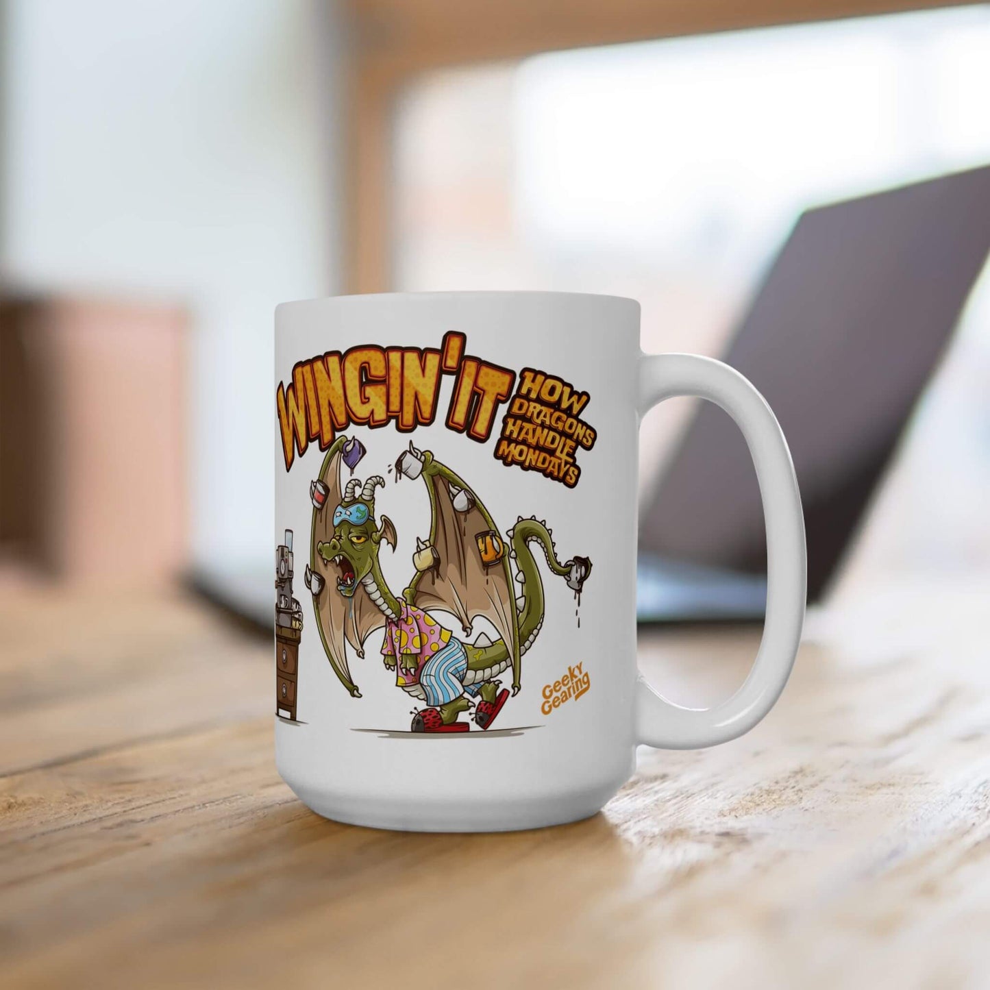 White mug with cartoon dragon design and text on a wooden surface