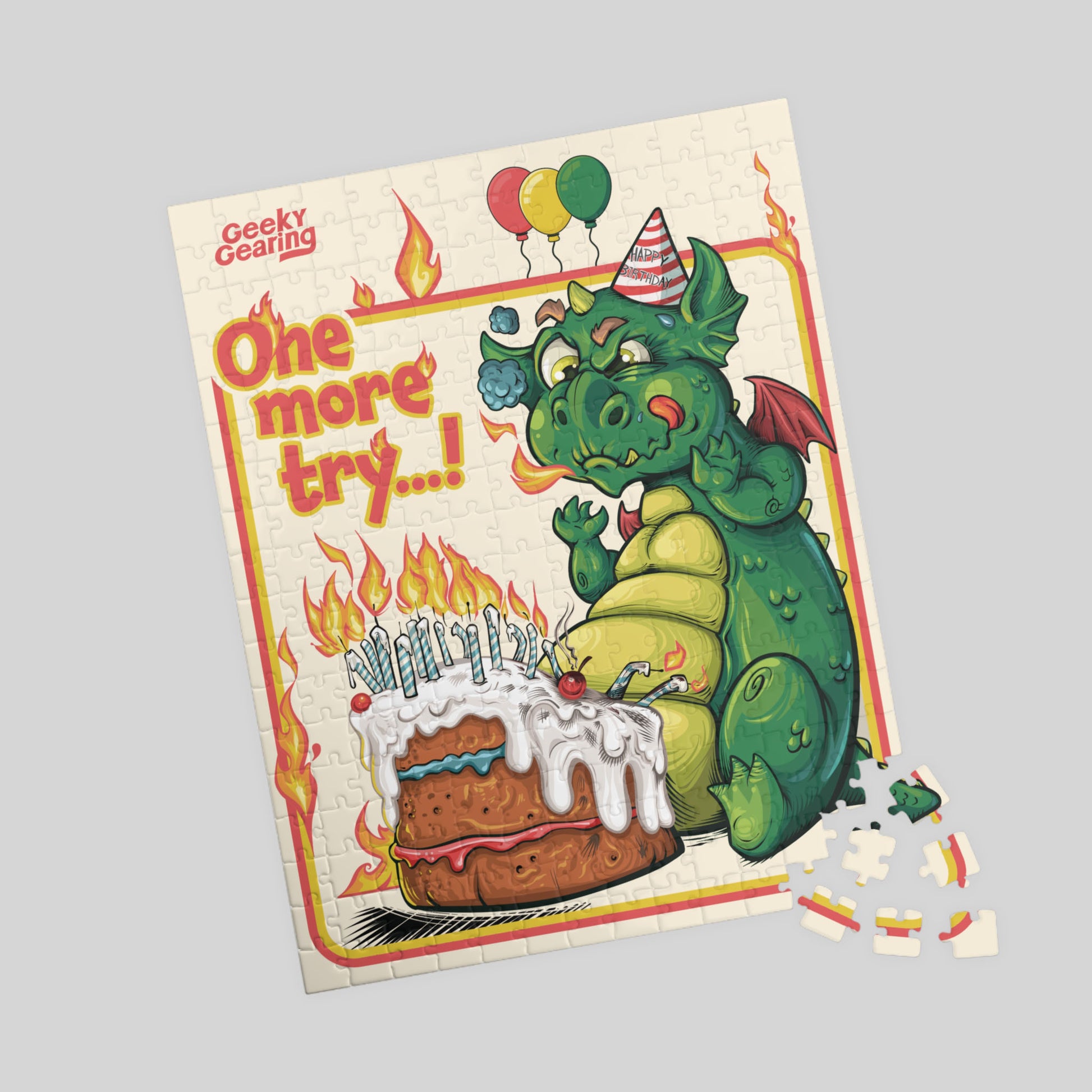 Puzzle with a dragon and cake illustration on a gray background