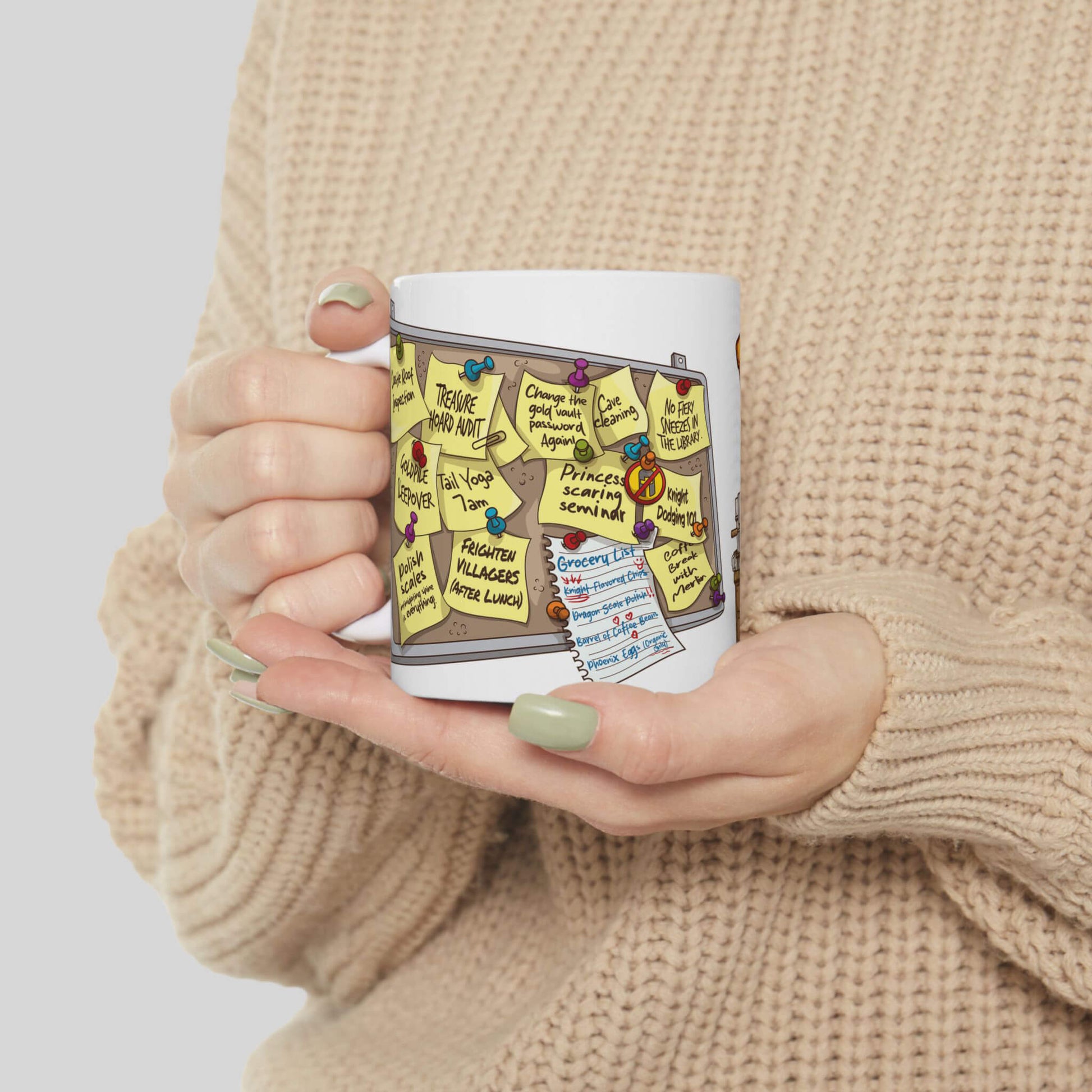 Person holding a mug with a colorful illustration of a to-do list on a white background