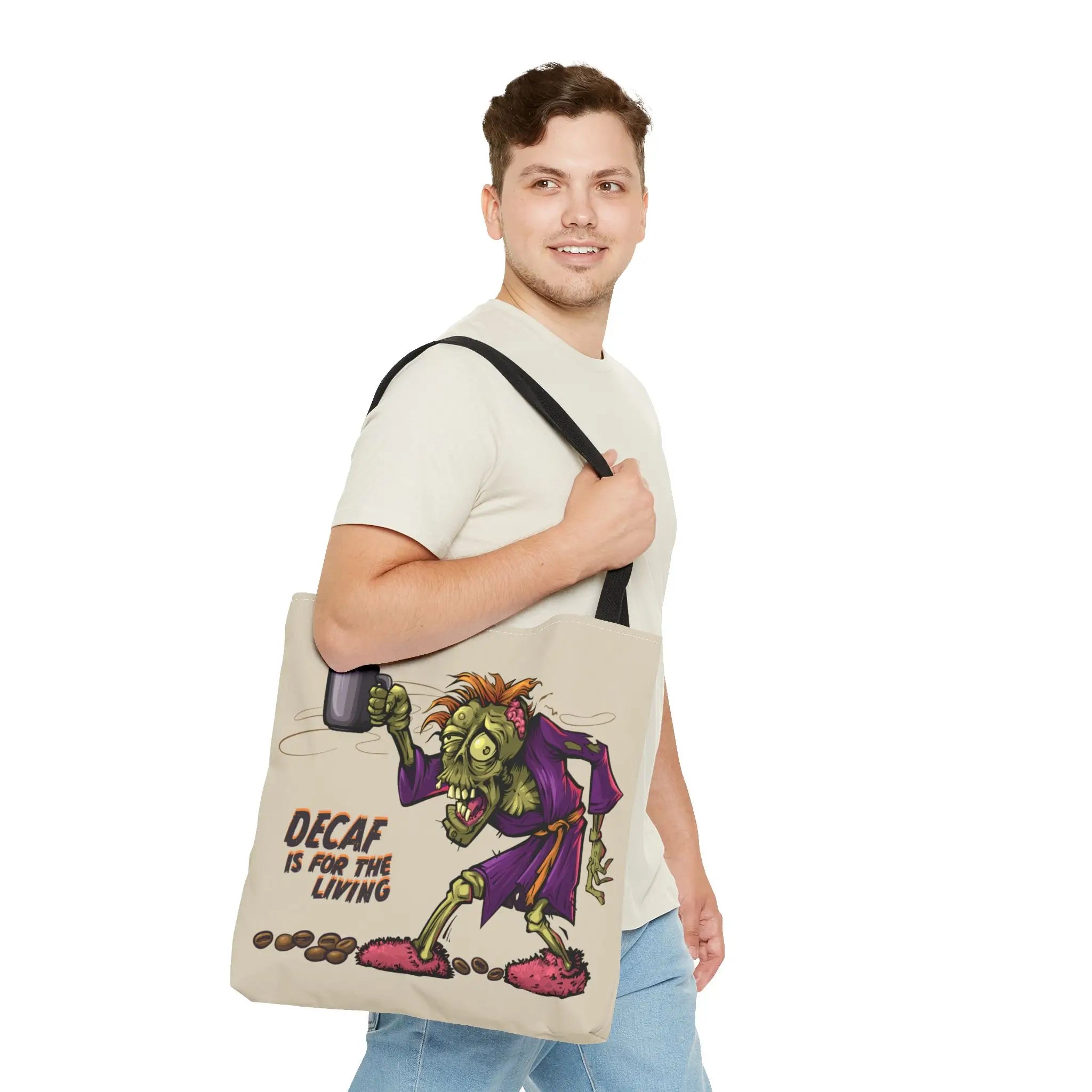 Man holding a tote bag with a graphic design and text on a white background