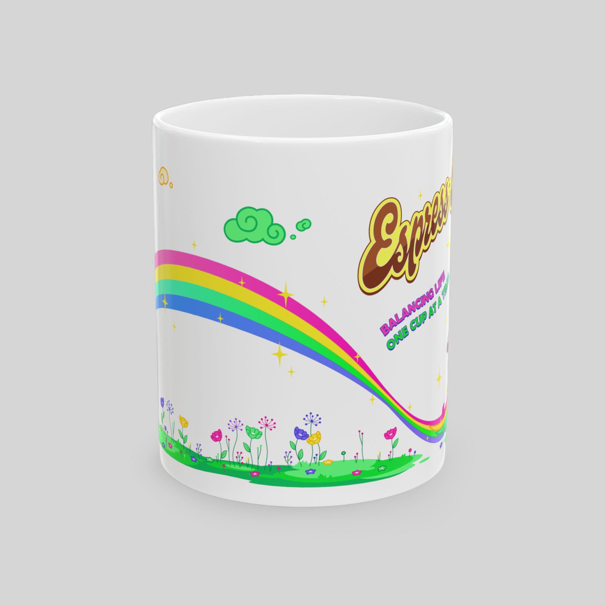 Mug with a colorful rainbow design and text on a gray background