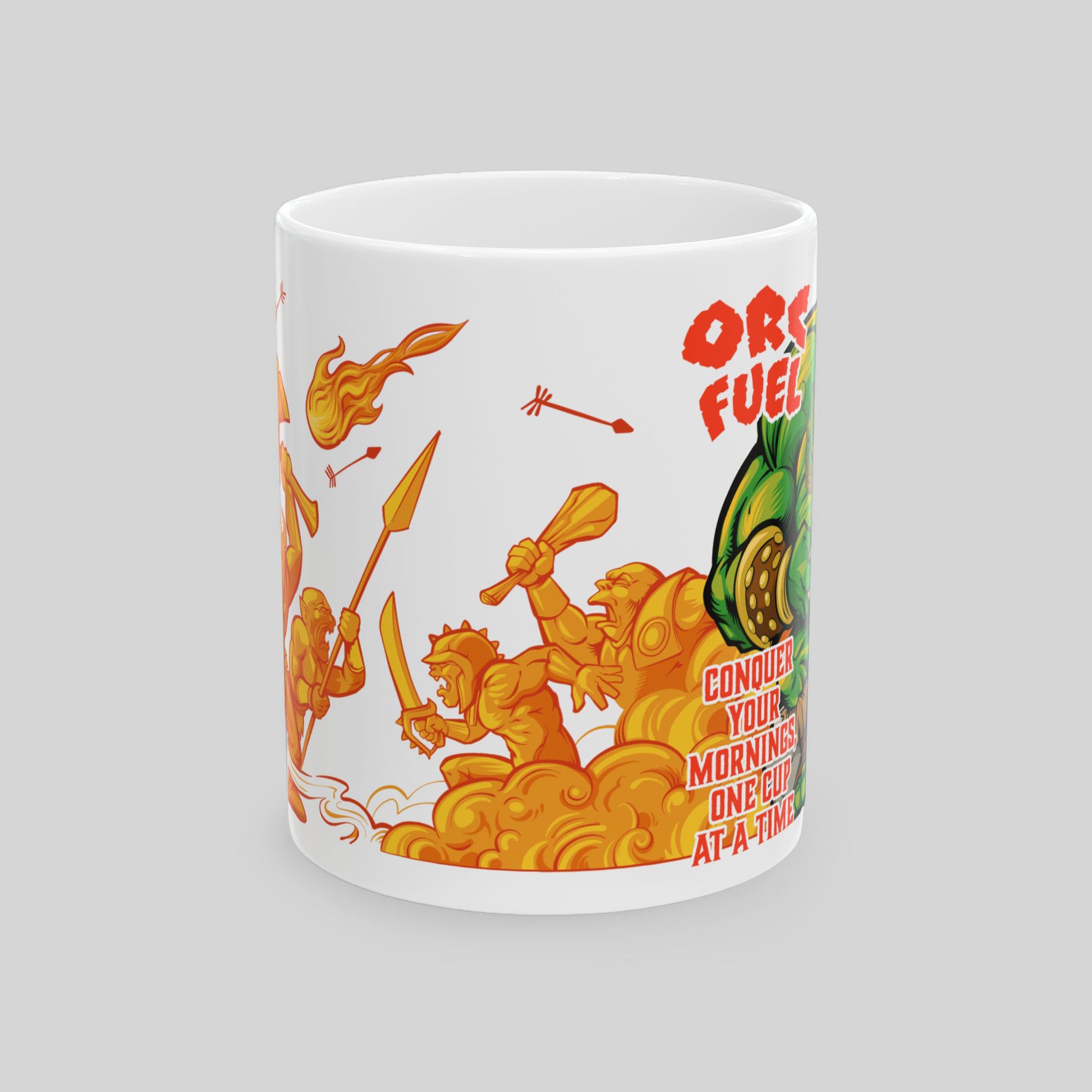 Front view of Orc Fuel ceramic mug with orange cartoon warriors in battle; text: “Conquer your mornings, one cup at a time”