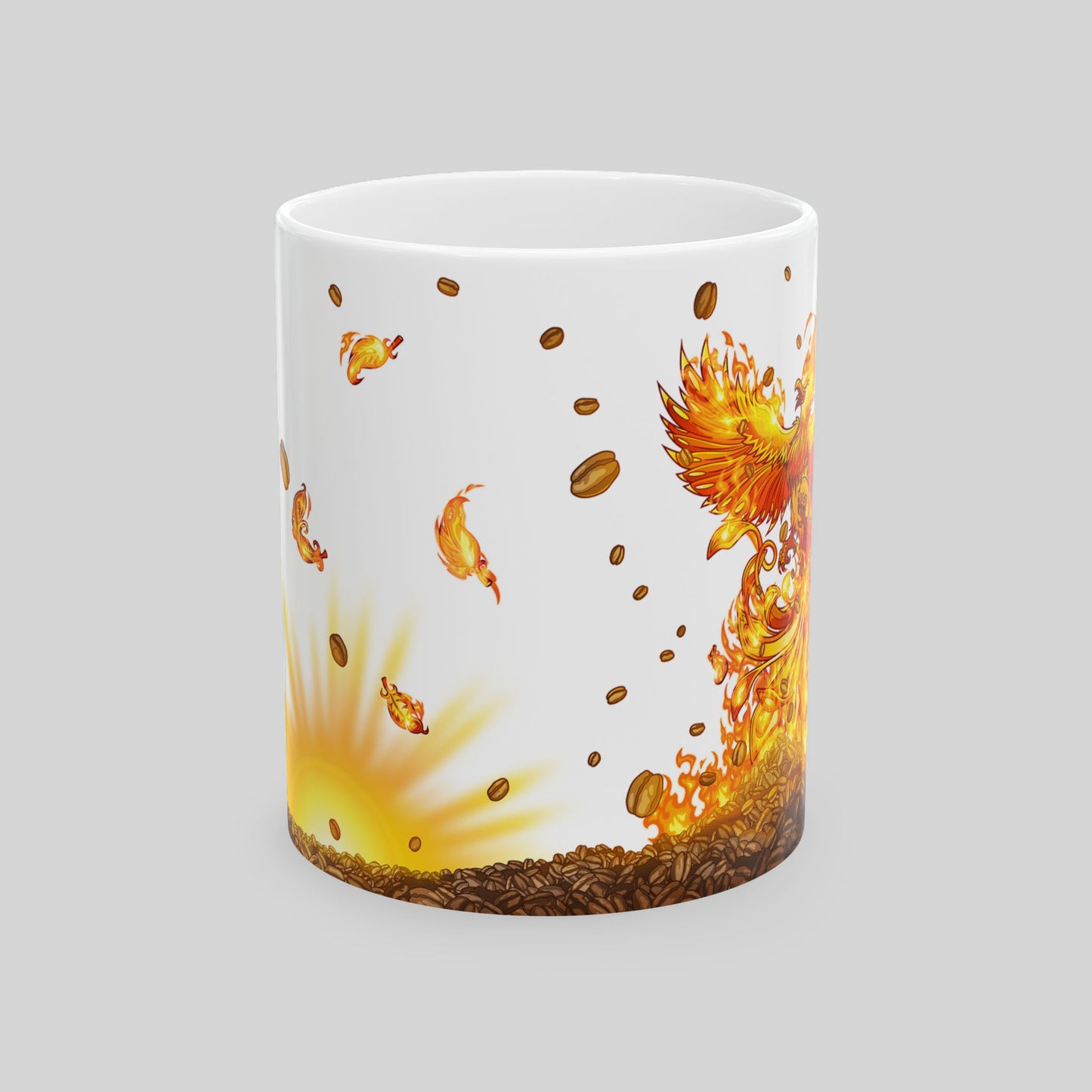White mug with phoenix and sunrise design on a white background