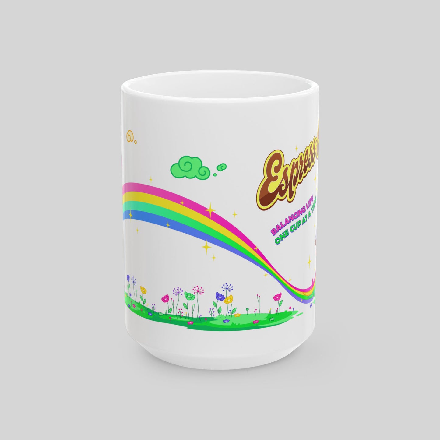 White mug with colorful design featuring a rainbow, flowers, and text on a gray background