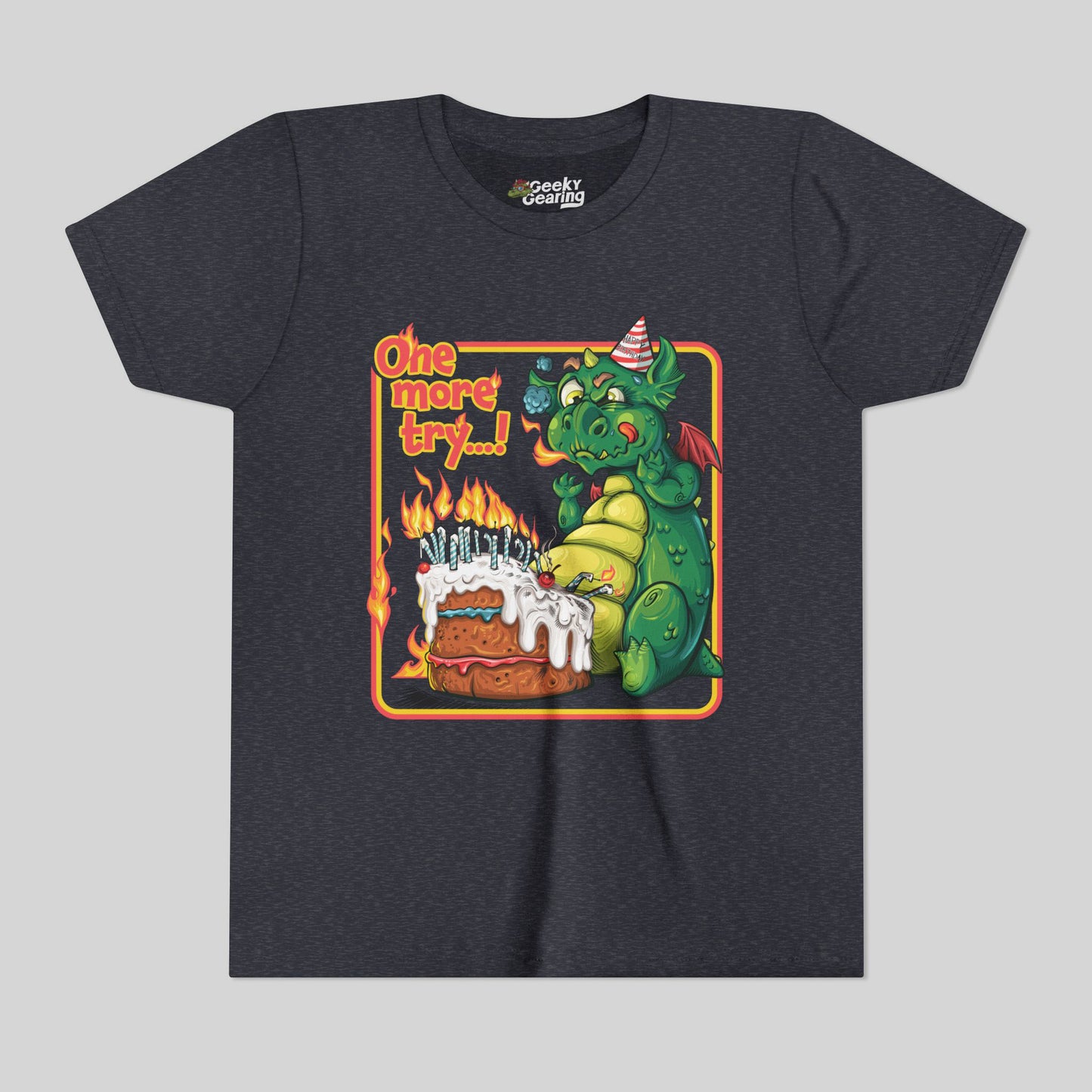 Navy heather t-shirt with a cartoon dragon and birthday cake graphic on a gray background