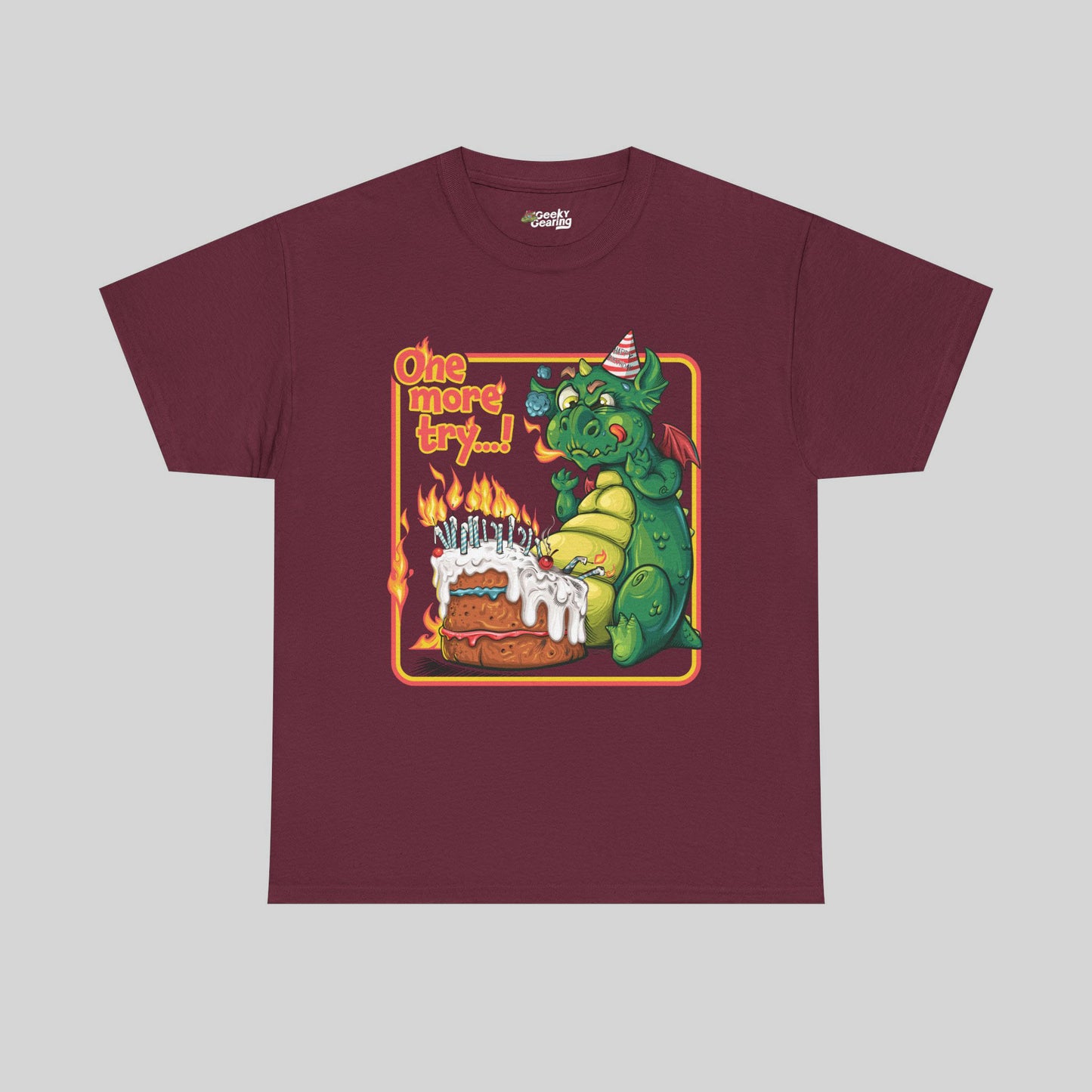 Maroon t-shirt with a dragon graphic and text on a gray background