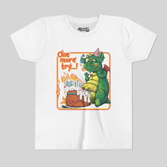 White t-shirt with a cartoon dragon celebrating his birthday with a big cake