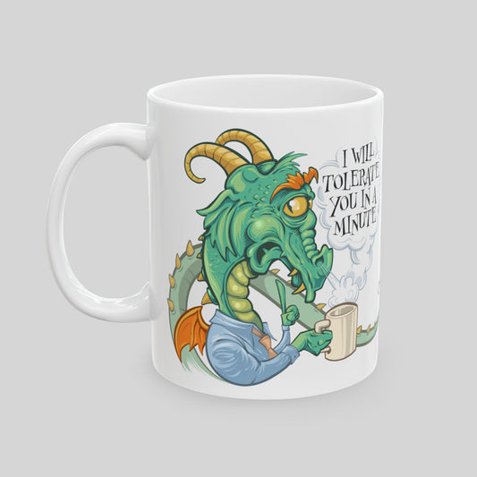 11 oz ceramic mug with a dragon in office shirt illustration and humorous text on a gray background