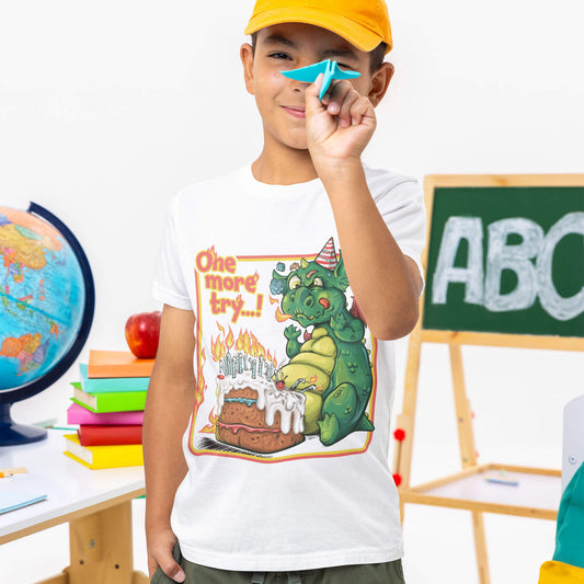Child wearing a t-shirt with a cartoon dragon celebrating his birthday in an educational setting
