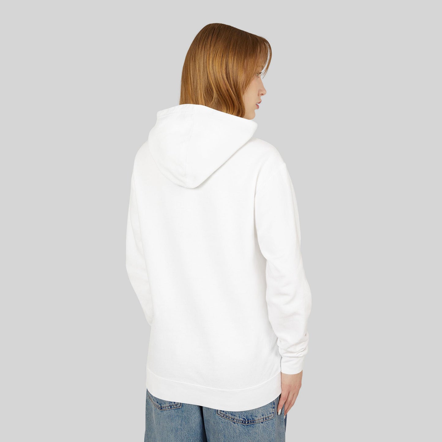 Person wearing a white hoodie on a plain background