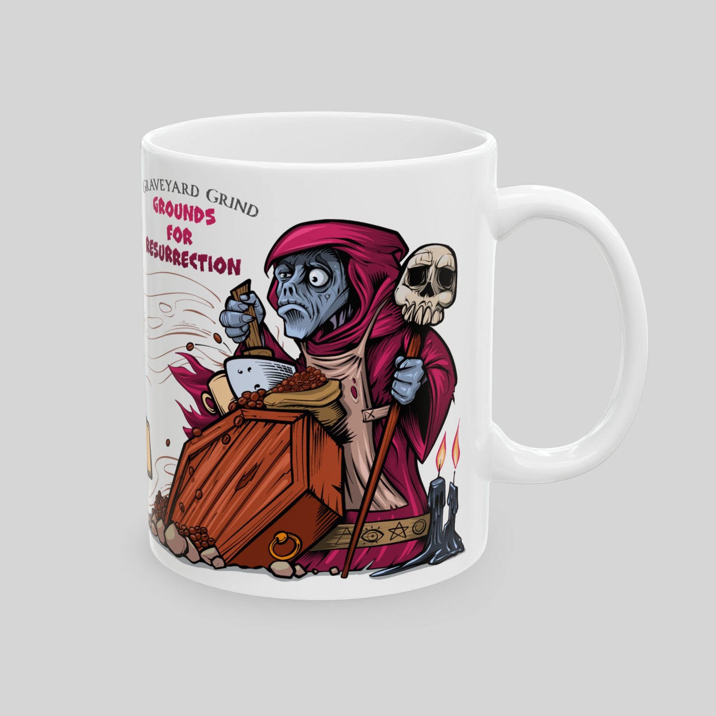 11 oz white ceramic mug with cartoon necromancer holding skull; text: “Grounds for Resurrection”