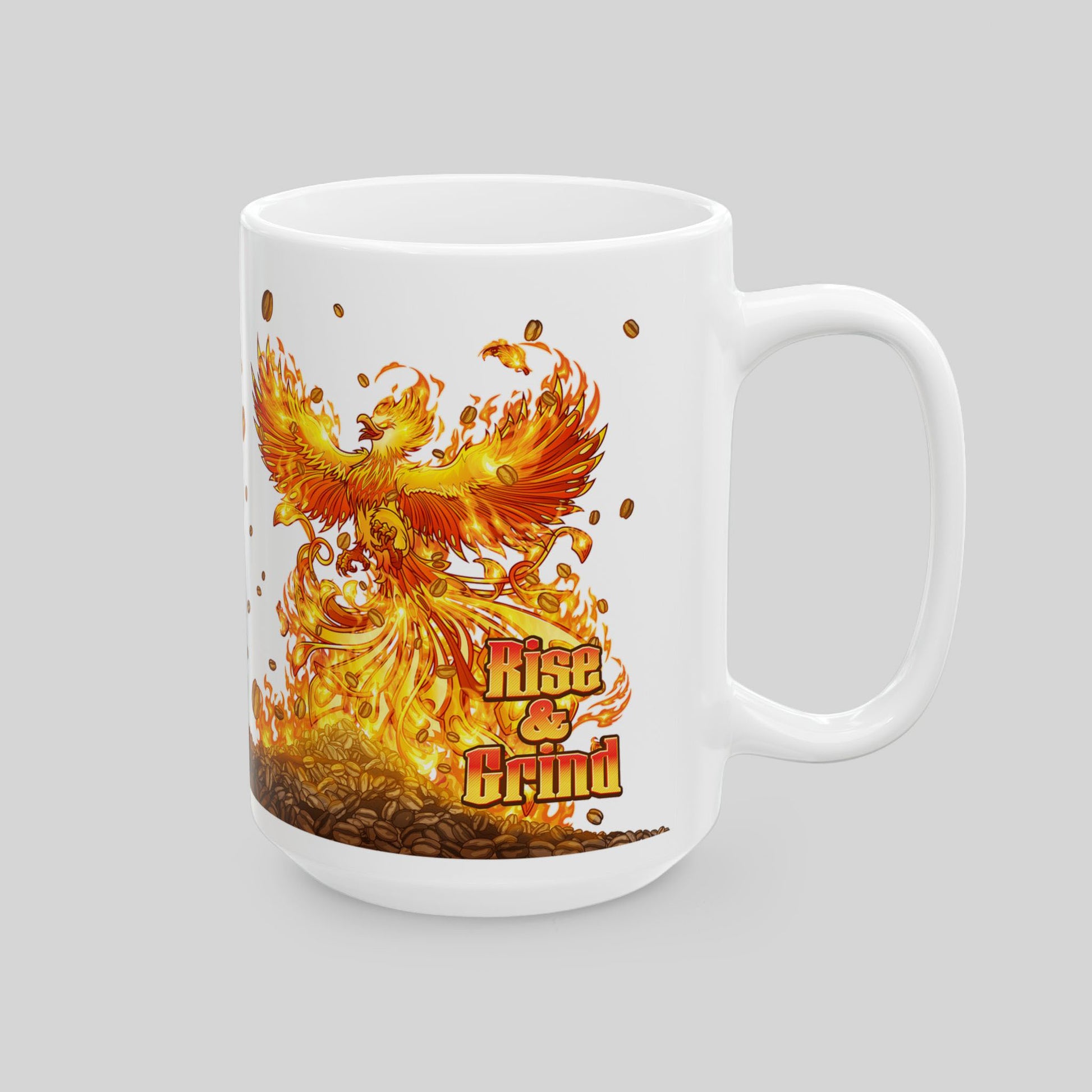White 15 oz ceramic mug with colorful phoenix rising from coffee beans; text: “Rise & Grind”