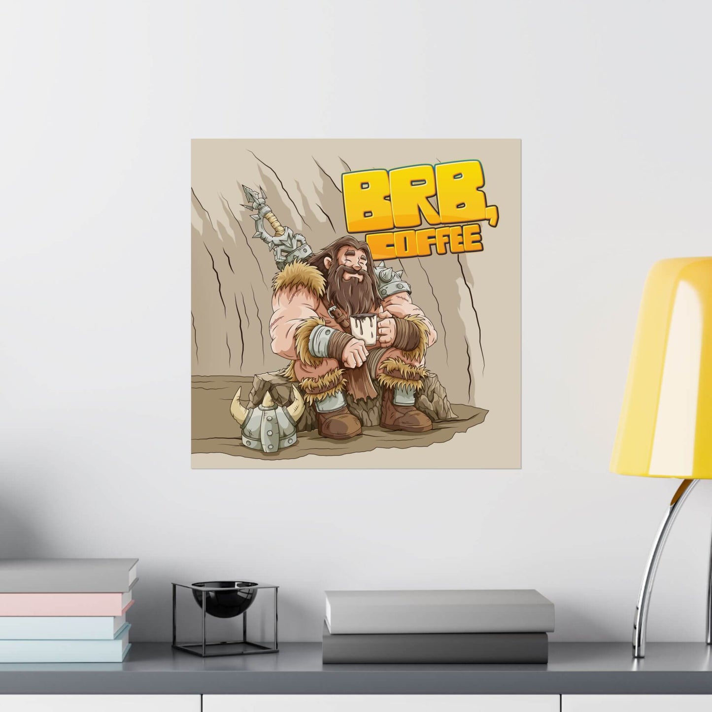 Funny barbarian coffee poster shown on a wall: a fur-clad warrior resting in a cave with a steaming mug, 'BRB, Coffee'.