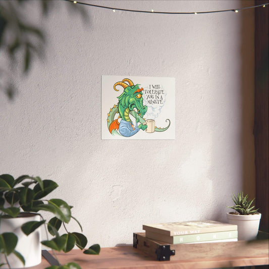 Funny grumpy coffee dragon poster shown on a wall: a horned dragon grumbling over a mug, 'I Will Tolerate You in a Minute'.