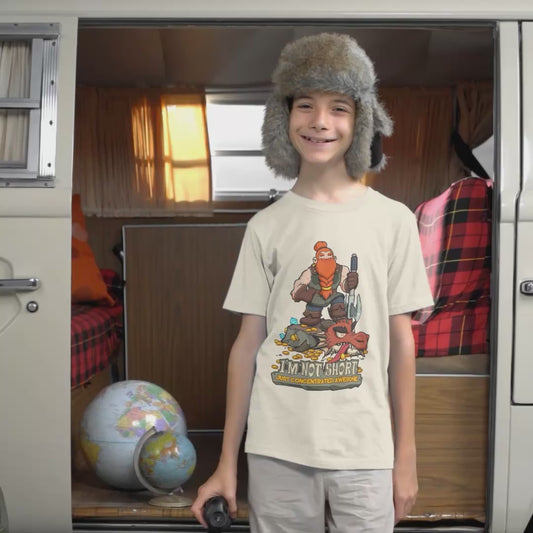 Boy wearing a T-shirt with a cartoon design of a dwarf who has conquered a dragon