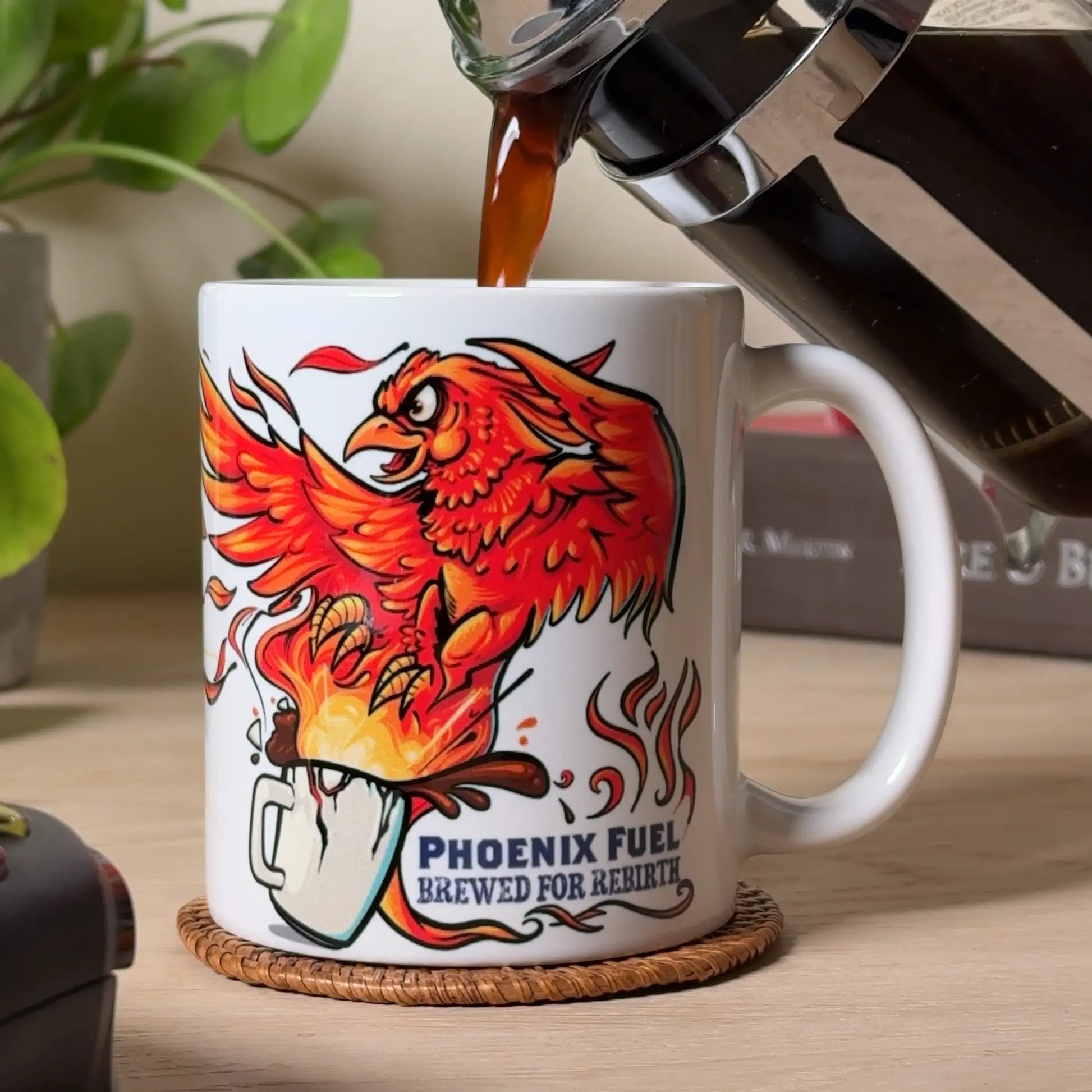 Video of GeekyGearing Phoenix Fuel mug rotating in hand; coffee poured from French press into mug.