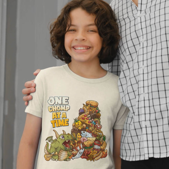 Baby Dragon's Feast - Youth Tee worn by a boy standing by his father