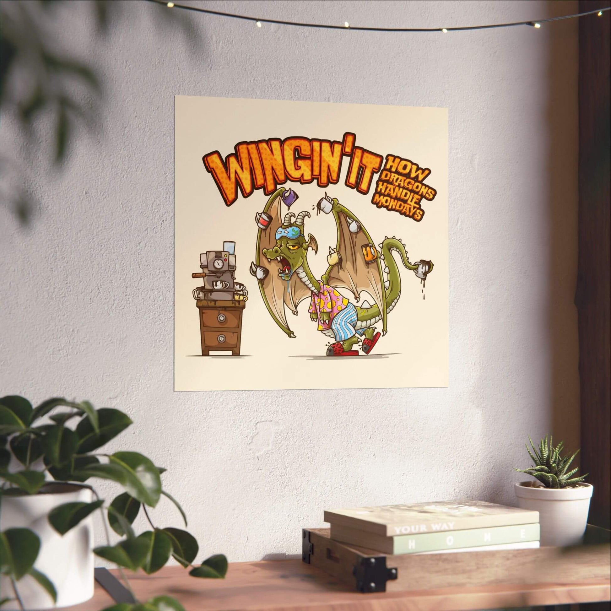 Funny coffee dragon poster shown on a wall: a frazzled dragon in pajamas, wings hung with coffee mugs, 'Wingin' It'.
