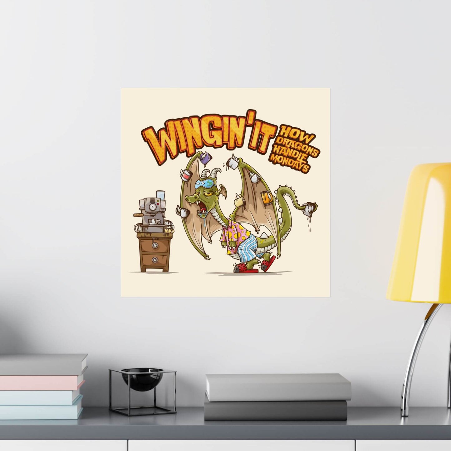 Funny coffee dragon poster shown on a wall: a frazzled dragon in pajamas, wings hung with coffee mugs, 'Wingin' It'.
